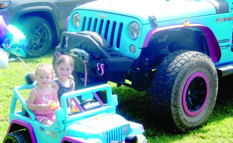 A matching pair of Jeep vehicles were attending the Jeep Invasion in Baxter Springs Saturday as Ivy Barnard and Dottie Pritchard were driving the smaller version. In keeping with the event. One of the events was a kiddie car show featuring Jeeps.