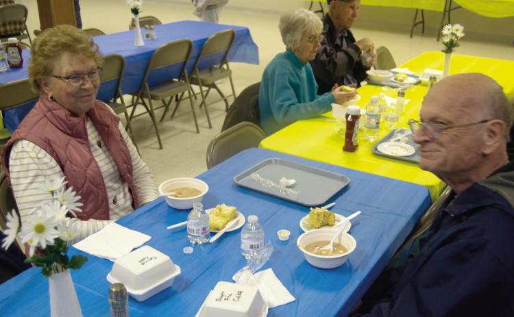 Alice and Ralph White were among those enjoying the recent bean feed sponsored by the Columbus Lions Club. The annual event always draws a crowd and is very popular with area residents.