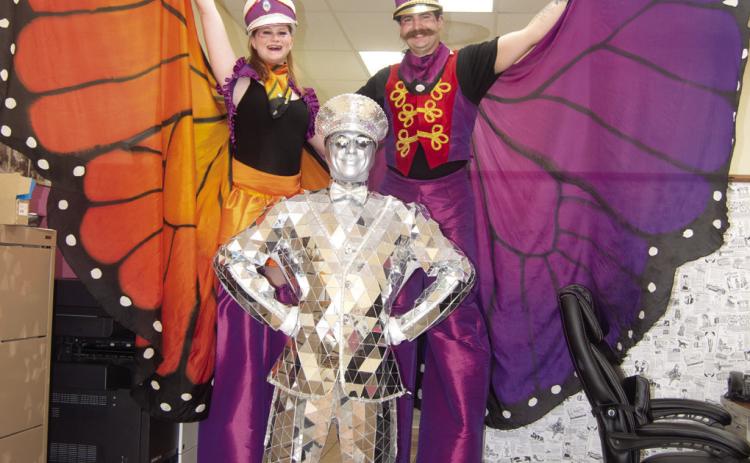 Stilt walkers as well as other types of street performers will be at the annual Columbus Day Festival. Make plans to attend. Remember, the balloon regatta has moved to Southwest 20th Street this year.