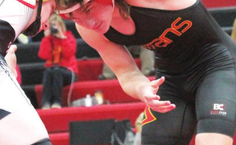 Titan Landon Proffitt, wrestles at the Burlington Total Team Varsity Tournament, Saturday in Burlington. Landon improved his record to 12-6 with his fourth place finish at the tournament. He will be recognized on Senior Night, Friday at the CUHS Gym. Courtesy photo.