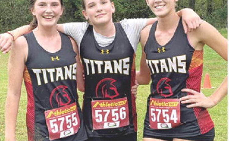 Lady Titans Cora Rider, Myah Tash, and Cara Altis competed in the 2026 CNC League Cross County Meet, Thursday, at Greenbush Educational Center. Courtesy photo.