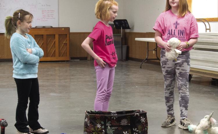At the Cherokee County 4-H Days, Prairie Rambler club members Saundra Culen, Emily Harris and Olivia Harris performed a skit Twas the Night Before the Fair. Other club members participating included Kayleigh Keller and Ashley Benge.