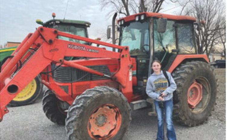 Grace Eshelman was one of the Columbus High School Future Farmers of America members who drove her tractor to school as part of FFA Week at CUHS. Due to the weather, the breakfast they had scheduled has been reset to Wednesday, February 26 from 7 a.m.-9 a.m. in the Ag room. Courtesy photo.