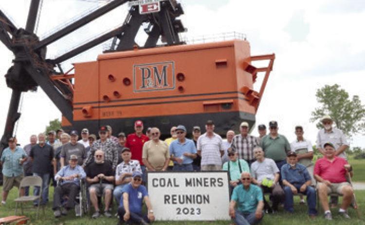 Retired coal miners and their families converged on Big Brutus June 3 for the annual miners reunion. Food, visiting and story telling were on the agenda for the day. Retired miners enjoyed fish and side dishes as they reconnected and reminisced with buddies. Big Brutus was one of the largest electric shovels used to surface mine coal. The shovel has become one of the top tourist attractions in Southeast Kansas. Photo by Emmett Sullivan.