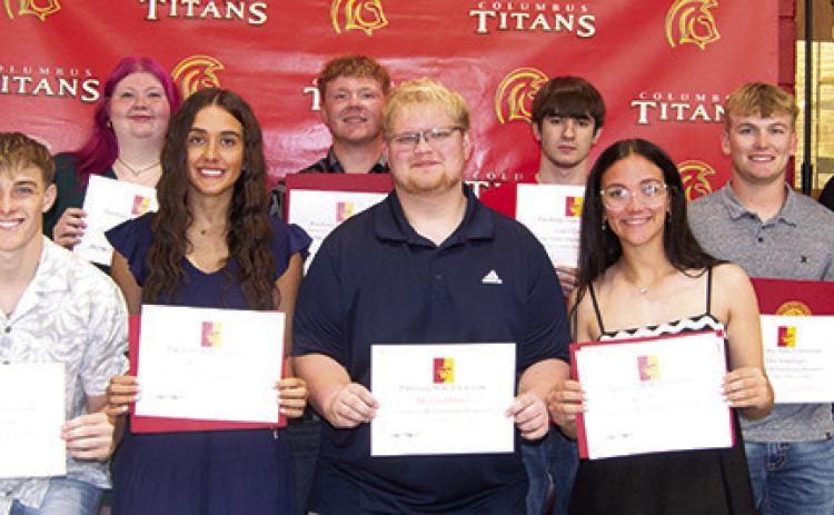 CUHS Seniors receiving scholarships from Pittsburg State University are front row: Korbyn Newberry, Brylie Johnson, Maddox Ochsner, and Katy Mooney. Back row: Robert Graham III, Ashlyn Ash, Kanyen Smith, Lydon Lovesee, and Syler Schuberger. David Hogard, PSU Representative presented the scholarships.
