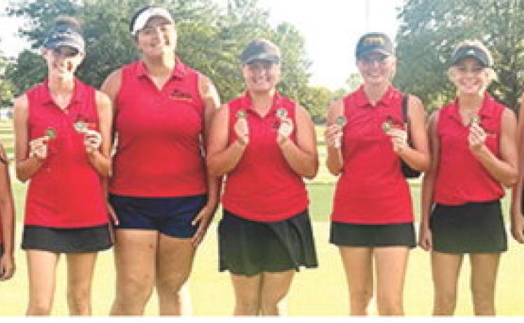 The Lady Titan Golf Team won their third of four CNC League Tournaments played this season at the Galena Invitational played at Schifferdecker Golf Course in Joplin, Mo., Thursday. Columbus edged Caney Valley with a team total of 361. The Lady Bullpups tallied four-man score of 365. St. Mary’s-Colgan was third with a 366 team total. Team members are: Amory Neely, Hannah Noel, Natalie Wary, Kristin Flinn, Fallon Smiley, Cali Carpino, Tyler Kirk, Addison Johnson, and Elaina Garcia. Courtesy photo.