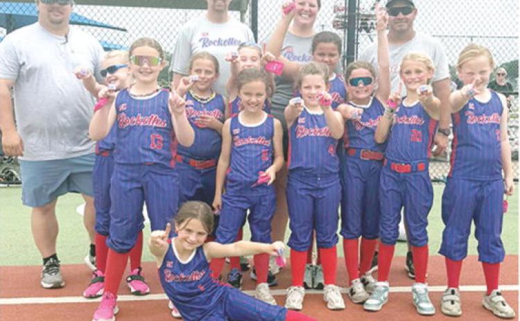 The Columbus 8U Rockettes won the Memorial Maynia Softball Tournament in Joplin, Mo. Friday and Saturday. The won two with no losses in pool play before winning the championship, 11-3. Team members are Emerson Carter, front; middle row: Amyx Evans, Morgan Moser, Oakleigh Mays, Kynlea Littlejohn, Aniah Palmer, Taylynn Midgett, Renley Knopp, and Jasmine Wininger; and back row: coaches, Jeremy Gulick, Lance Moser, Anna Moser and Bryan Midgett. Courtesy photo.