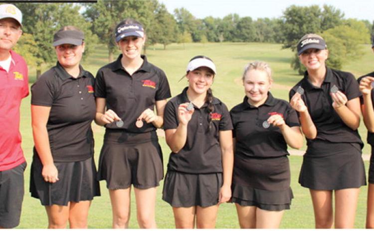 The Columbus Unified High School Lady Titan Golf Team hosted their season opener, Columbus Invitational, Thursday, at the Brush Creek Golf Course. Led by Cali Carpino, who placed second in individual scoring, the Lady Titans placed second in the team standings, three strokes behind Caney Valley. Team members are: Coach Jerry Smiley, Fallon Smiley, freshman; Natalie Wary, junior: Hannah Noel, junior; Amory Neely, junior; Cali Carpino, freshman; and Addison Johnson, freshman.