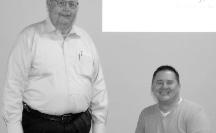 At the recent Cherokee County Economic Development breakfast and awards ceremony, the Columbus News Report was presented with the Hall of Fame Award. Larry Hiatt, owner and publisher of the newspaper accepted the award from Brian Smith, president of the Economic Development board.-
