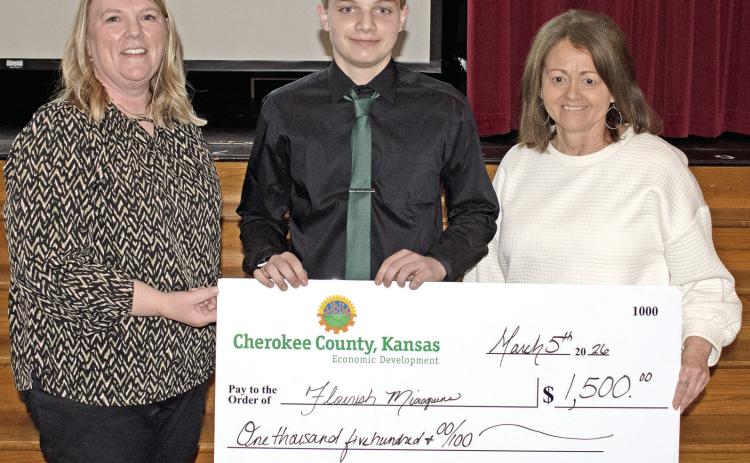 A microgreens company called Flourish Microgreens founded by Jacob Busse from Baxter Springs High School was the top winner at the Youth Entrepreneurship Fair held Thursday, March 5. Holly Johnson and Donna Westervelt presented Busse with his $1,500 check.