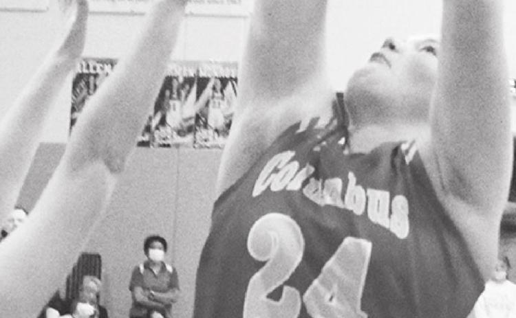 Lady Titan Senior, Bailey Monroe, goes up for a shot in the Class 3A Sub-State loss at Cherryvale, 57-34, Monday night. Columbus was eliminated from the tournament, ending their season.
