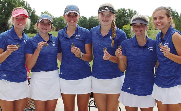 The St. Mary’s-Colgan Lady Panthers earned their third consecutive Kansas Class 3-1A State Championship, Tuesday, in Hutchinson. Lady Panther Senior, Ali Scripsick, placed second to pace her team in the three-peat win. Team members are: Greta Ison, senior; Ava Scripsick, sophomore; Ali Scripsick, senior; Audrey Goetting, senior; Zoey Smith, senior; and Molly Swezey, sophomore. The team is coached by Kim Correll Scripsick, Lady Titan State Championship Golfer.
