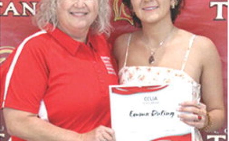 Emma Duling received a $250, Sammie Ross, CCLIA Scholarship from CCLIA Representative, Rhonda Herrenbruck, during the May 16, 2025 Senior Assembly at the CUHS Gymnasium.