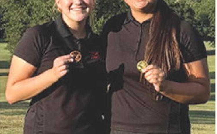 Lady Titan Kristen Linn, took first place and Elaina Garcia placed fourth in the Baxter Springs Junior Varsity Golf Tournament, Tuesday. The freshmen pair had rounds of 52 and 60 respectively on the day for Columbus. Courtesy photo.
