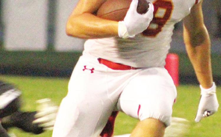 Titan Junior All-Conference Linebacker, Kick Returner, and Wide Receiver, Landin Midgett, was lost for the season in the Titans second series of their first game, Saturday morning in Frontenac. Landin will have surgery on his right tibia to repair the damage and will be sidelined for the entirety of the Titans 2021 schedule. Above, Landin runs back a punt return for the Titans first possession of the year.