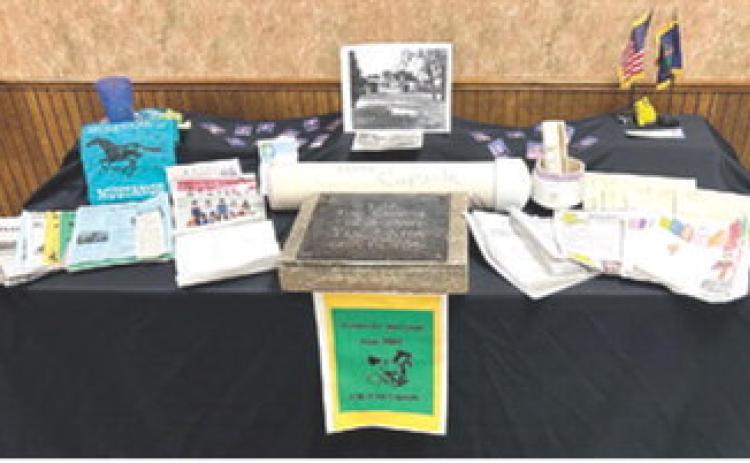 Students who attended Greenlawn Elementary School 25 years ago were able to view the items they placed into a time capsule. The capsule was recently dug up and was opened up Wednesday night at the Cherokee County Fair. The items are currently on display in the board office.