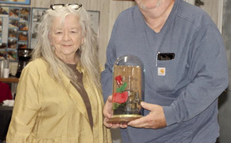 The annual Miners Lamp award was presented to Joyce and Roe Parsons at the Big Brutus annual meeting at the Weir Senior Center Saturday evening. The Parsons were recognized for their volunteer efforts over the years on behalf of Big Brutus. He was particularly recognized for the playground equipment he donated to the Big Brutus Park and the work repairing the bell from the City of West Mineral. Photo by Emmett Sullivan.