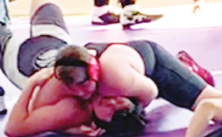 Kash Smith, won the 12U, 190-215, title at the 13th Annual Frontenac Brawl, Sunday. Kash had two pins including this one against William Bishop, Girard Matside Wrestling Acade, in the championship during the morning session of the tournament in Frontenac. Courtesy Photo.