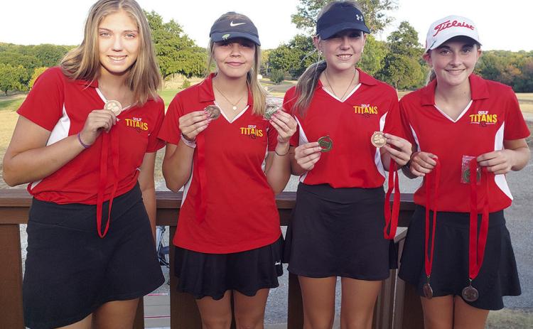 The Columbus Lady Titan Golf Team completed their 2022 regular season at the Baxter Springs CNC Invitational Tournament, Tuesday, at the Baxter Springs Country Club Golf Course. The Lady Titan Team placed third in team standings and sophomore, Mallory Thompson, taking fifth in individual placings. Displaying their hardware are: sophomore, Anna Head, senior, Kenlyn Christiansen, junior, Reese Grundy, and Thompson. Courtesy Photo.