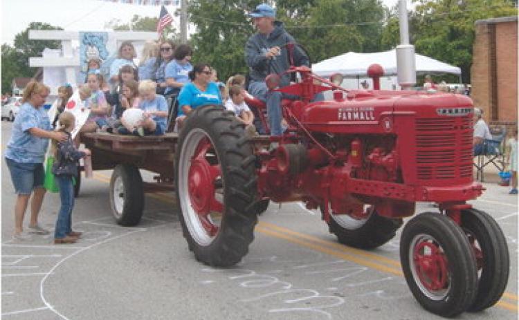 Willie Morrison drove his 1951 Farmall Tractor up the parade route at the Weir Homecoming Parade held recently.