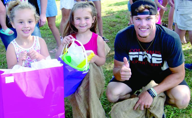 Freedom Fest sack race competition in the girls under six division Kynedy Duley was first and Emersyn Carter was second. Austin Hoiser the starter and judge presented the prizes to the girls.