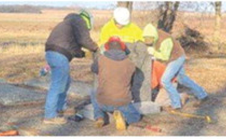 Frontenac High School students who are enrolled in Masonry in Fort Scott Community College’s CTEC program spent their morning December 20, repairing the vandalized headstones at Star Cemetery near West Mineral.