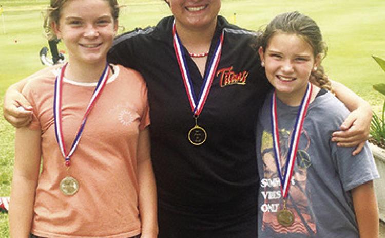 Lyndee Smiley placed second in the girls 9-11 age group at the SEK League Junior Golf Tournament in Independence, Thursday. Fallon Smiley took first place in the girls 12-14 age division, and Alaina Smiley finished fourth in the girls 9-11 age division. The sisters, representing the Columbus Rec Junior Golf Program, each earned a medal for their collections.