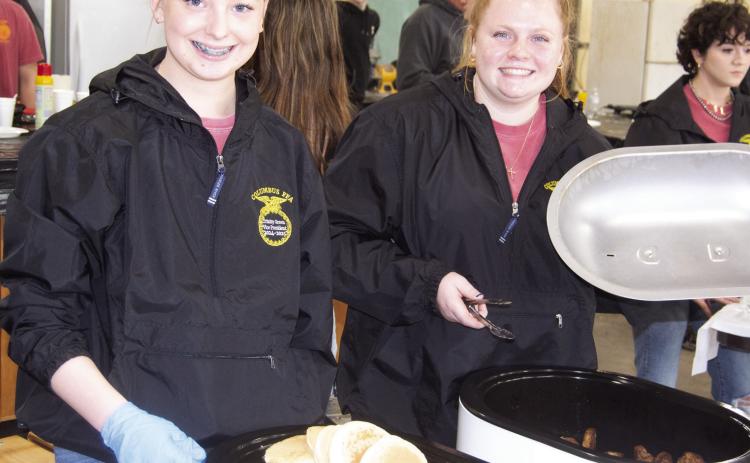 National FFA week was celebrated Thursday morning with a pancake and sausage breakfast in FFA shop at Columbus High School. The students served approximately 150 visitors pancakes and their Blue and Gold sausage. Trinity Green and Madisen Rand were serving the visitors.