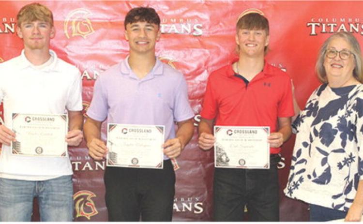 Hunter Ruddick, Jayden Rodriguez and Cal Saporito, CUHS Seniors, received recognition of achievements for the Crossland Kickstart Program from Marta Brown, Crossland Representative during the Senior Assembly, May 15, at the Columbus Unified High School Gymnasium.