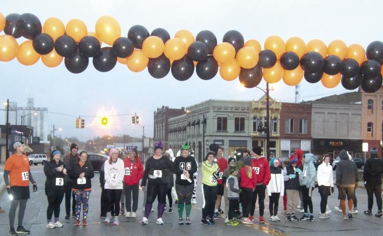 At the annual Titan Band and Team Threads Zombie 5K 45 contestants lined up at the start line despite the gloomy weather.