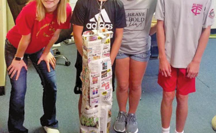 Making a paper likeness of the twin towers